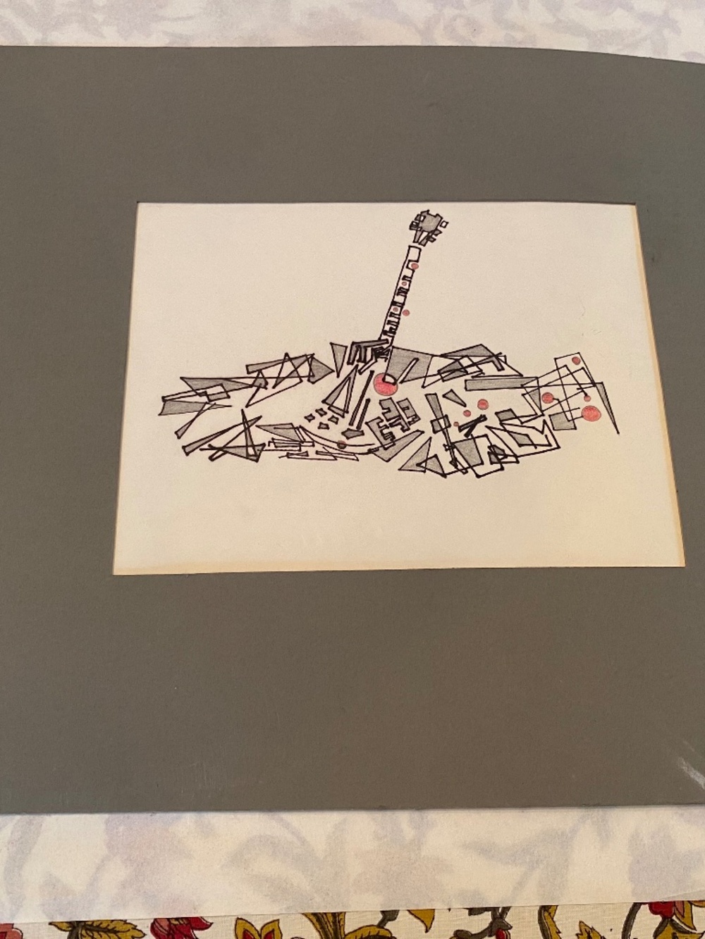 Pen and ink drawing of deconstructed guitar